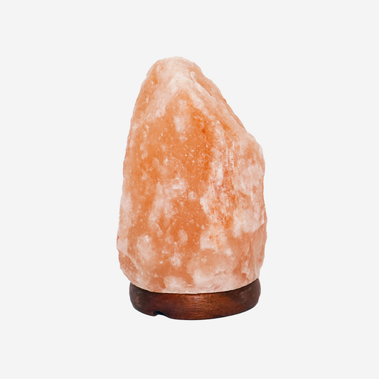 Natural shape salt lamp on a white background