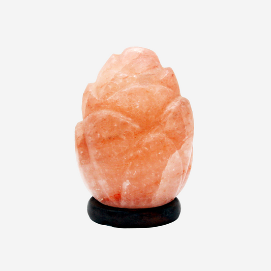 Himalayan salt lamp shaped like a blooming flower on a white background